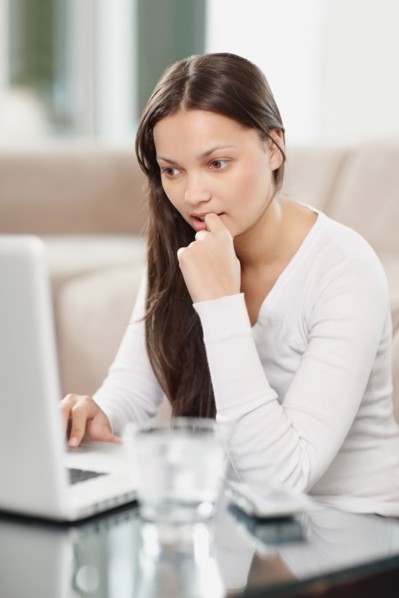 Woman browsing the internet. Photo. momentimages