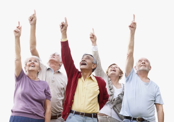 Group of seniors pointing up. Photo : momentimages
