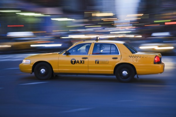 Taxi cab driving in the evening. Photo : Antonio M. Rosario
