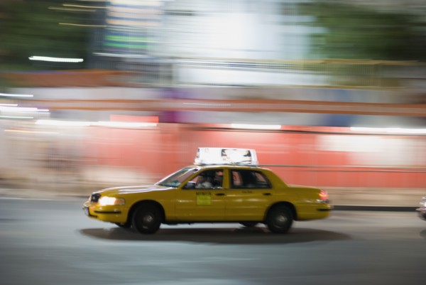 Taxi cab driving at night. Photo : Antonio M. Rosario