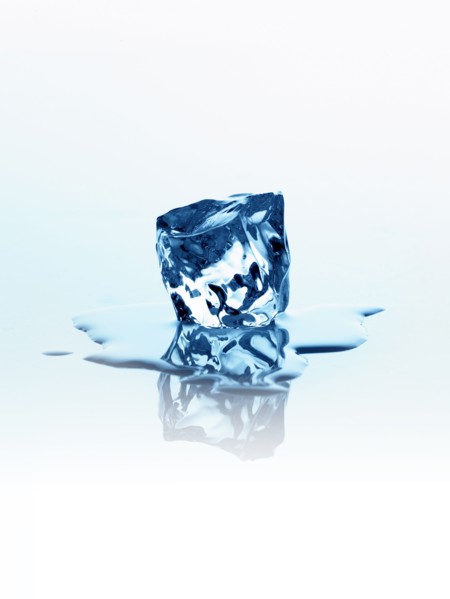 Melting ice cube. Photo : David Arky