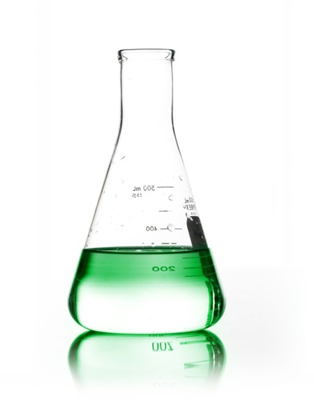 Green liquid in beaker. Photo. David Arky