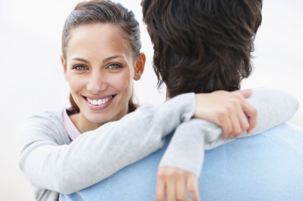 Couple embracing. Photo. momentimages