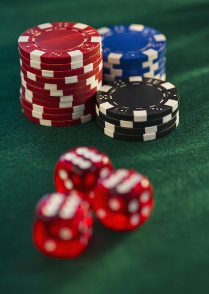 Poker chips and dice. Photo. Daniel Grill