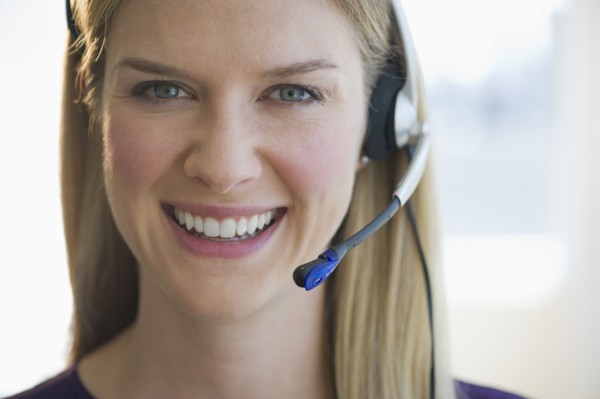 Woman wearing headset.