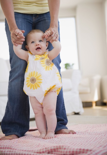 Baby's first steps. Photo : Jamie Grill