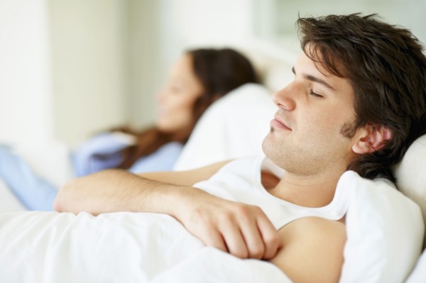 Couple sleeping. Photo. momentimages