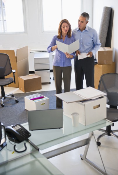 Business entrepreneurs working in startup office.