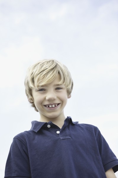 Cute young boy. Photo : momentimages
