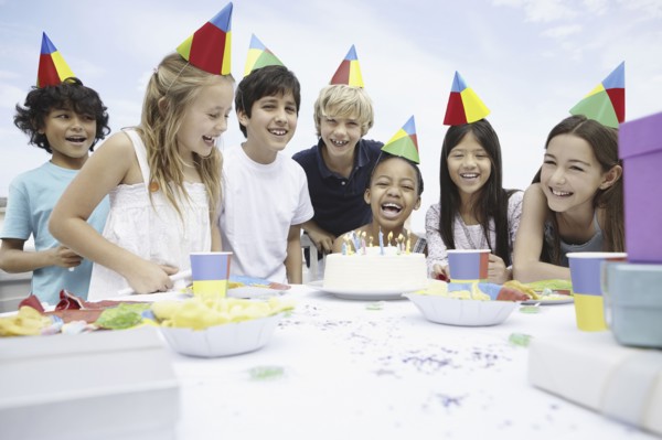 Children at a birthday celebration. Photo. momentimages