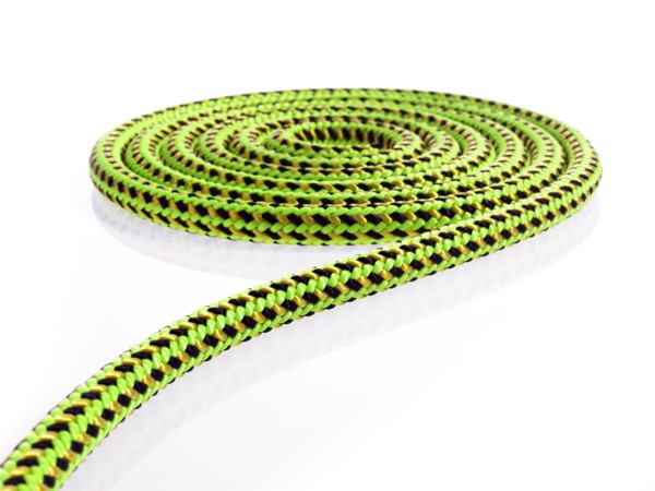 Green and black rope in a circular pattern. Photo : David Arky