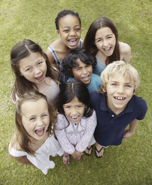 Group of excited children. Photo : momentimages