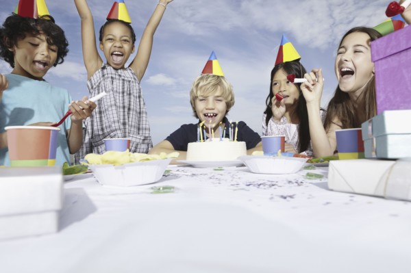 Children at a birthday celebration. Photo. momentimages