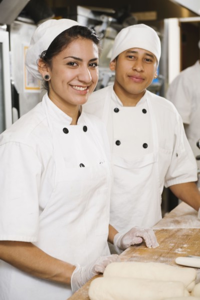 Chefs in bakery.