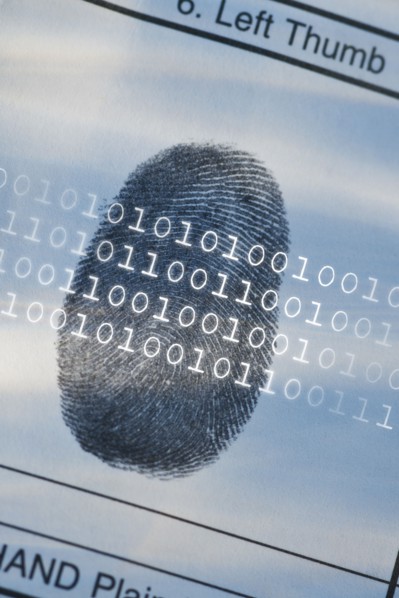 Computer code over thumbprint.
