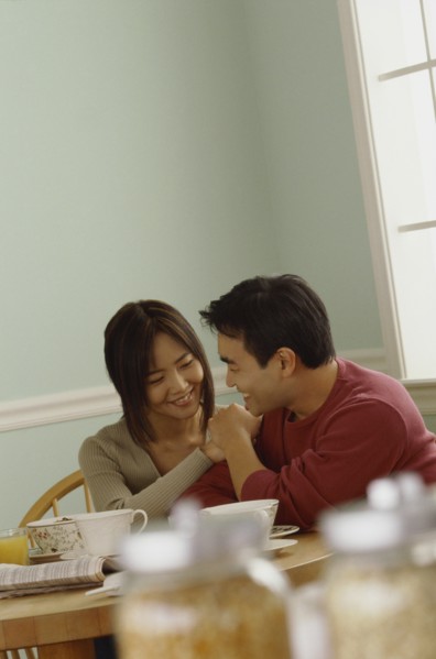 Happy couple in their home. Photo : Fisher Litwin