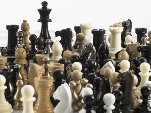 King with group of chess pieces. Photo : David Arky