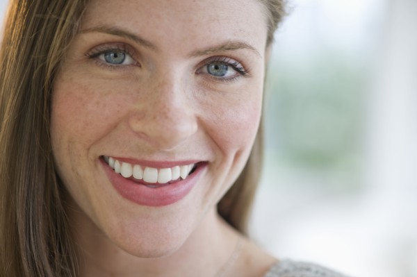 Portrait of smiling young woman.