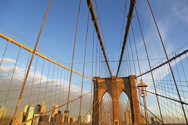 USA, New York State, New York City, Span of Brooklyn Bridge, Manhattan skyline in background. Photo