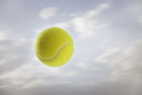 Tennis ball against sky. Photo : Mike Kemp