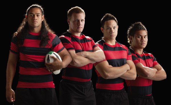 Studio portrait of male rugby team. Photo : Mike Kemp