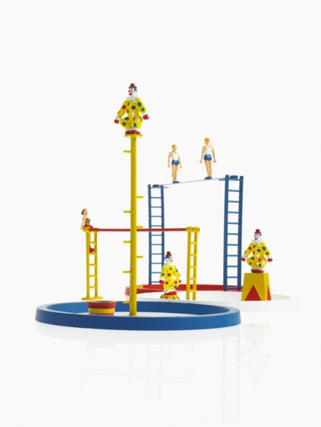 Studio shot of figurines on ladders. Photo : David Arky