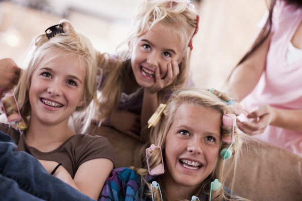 USA, Utah, family portrait of sisters (6-7, 8-9, 12-13, 14-15, 16-17) preparing hairs and having