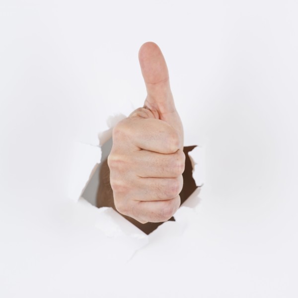 Hand on white background gesturing. Photo : Daniel Grill