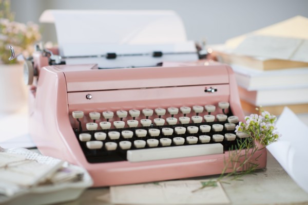 Letters by antique typewriter.