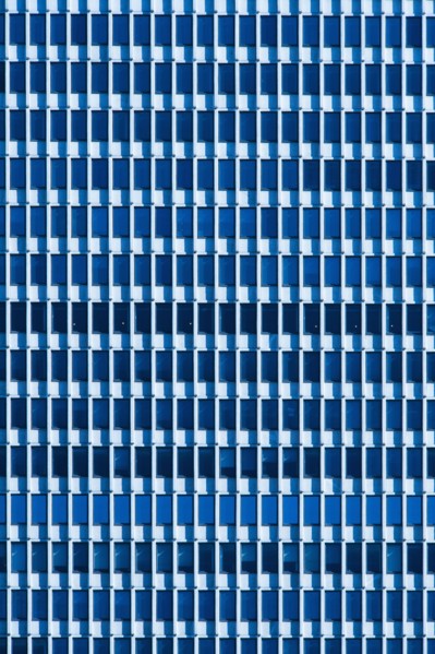 USA, New York, New York City, Windows of office block.
