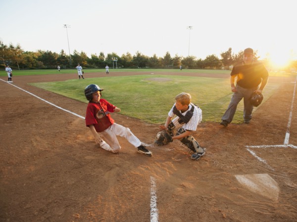 USA, California, Ladera Ranch, boys (10-11) playing baseball.