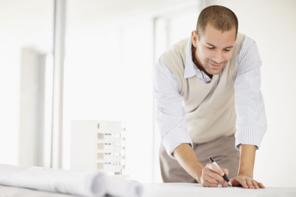 South Africa, Architect working in office. Photo : momentimages