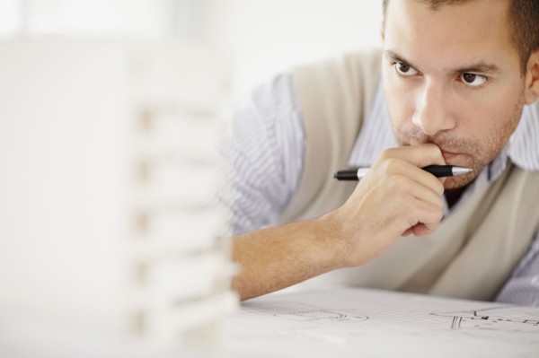 South Africa, Architect working in office. Photo : momentimages