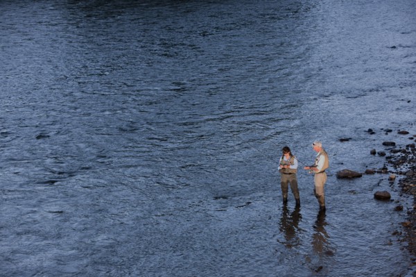 Canada, British Columbia, Fernie, Couple fly fishing in river. Photo : Dan Bannister