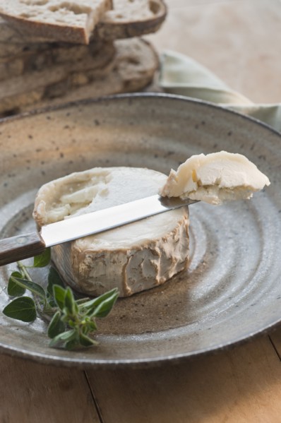 Brie cheese on plate.