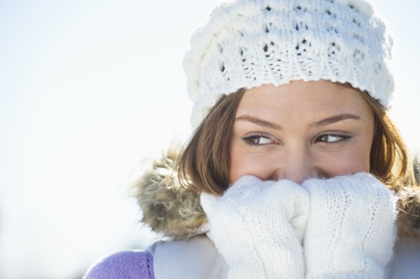 USA, New Jersey, Jersey City, Portrait of young woman wearing white knitted hat.