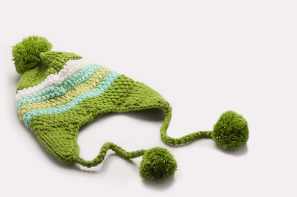 Green and white wooly hat. Photo : FBP