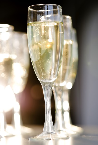 Close up of champagne flutes. Photo : Jamie Grill Photography
