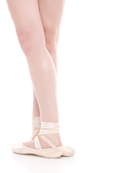 Ballet dancer's legs, studio shot. Photo : Dan Bannister