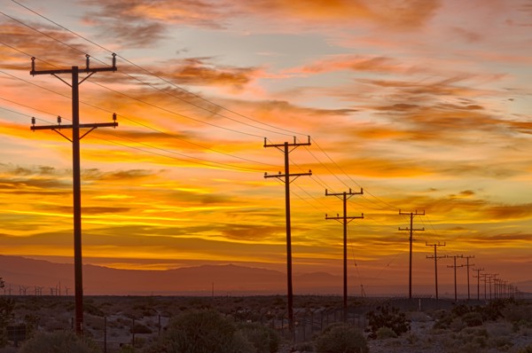 USA, California, Palm Springs, power line at sunrise. Photo : Gary Weathers