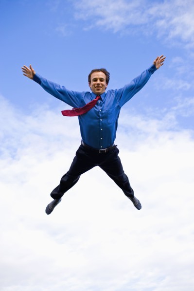 Businessman mid-air. Photo : Noah Clayton