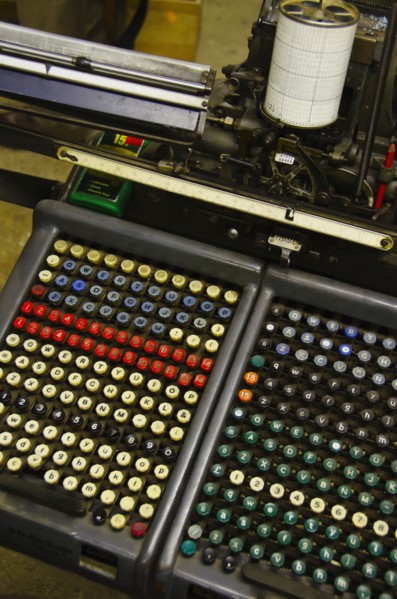 Close up of push buttons from printing press.