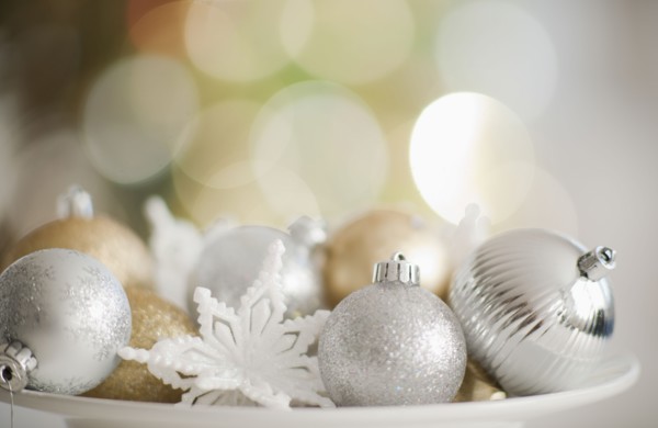 Christmas baubles on plate.