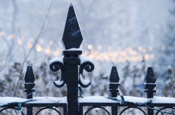 USA, New York State, New York City, antique fence covered with snow.