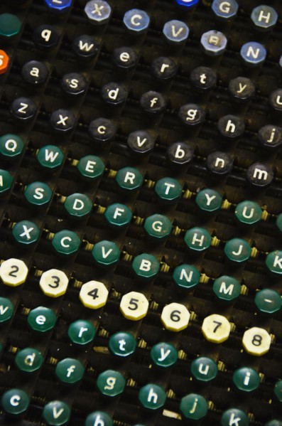 Close up of push buttons from printing press.