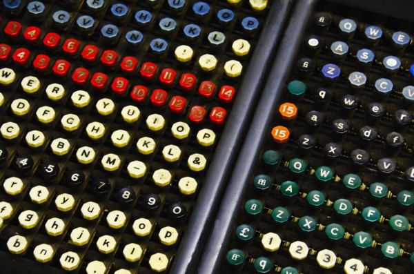 Close up of push buttons from printing press.