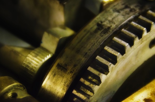 Close up of cog from antique printing press.
