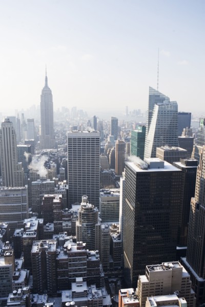USA, New York City, View of Manhattan covered with snow, with Empire State Building in background.