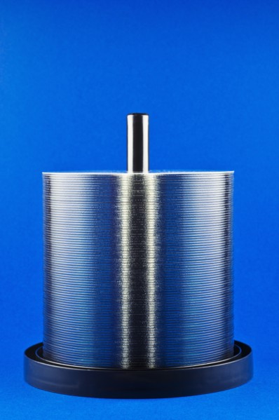 Studio shot of stack of CDs on spindle. Photo: Antonio M. Rosario