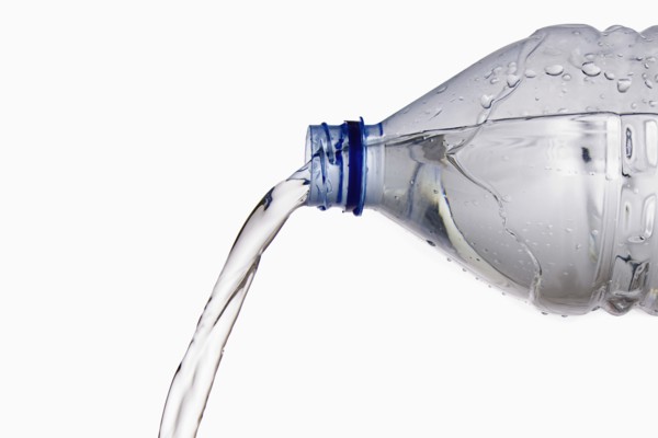 Pouring Cold Water from Bottle